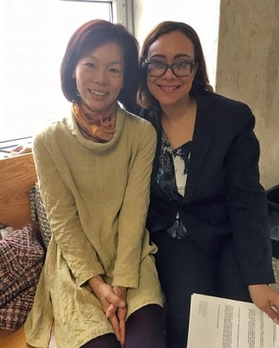 Photo of Attorney Desiree Claudio Claudio with client Ms. Chikako